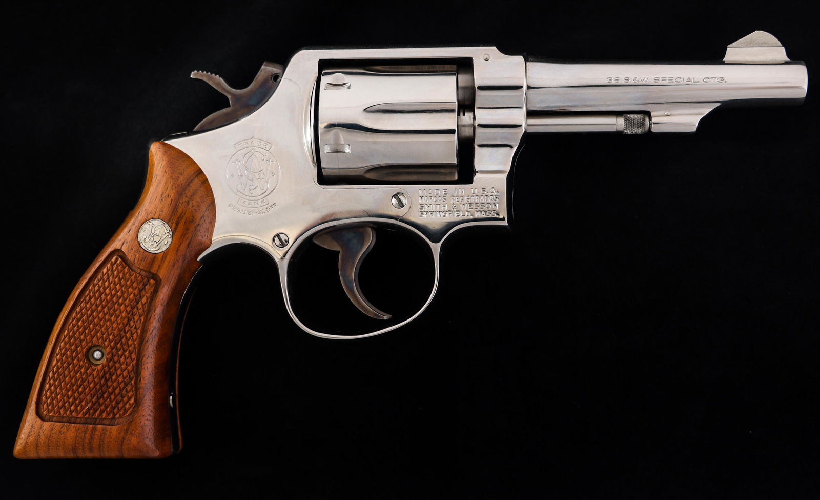 SMITH & WESSON MODEL 10-5 .38 S&W CAL REVOLVER: SMITH & WESSON MODEL 10-5 .38 S&W CAL REVOLVER Smith & Wesson Model 10-5 .38 S&W caliber double action revolver. Nickel chrome finish. Fluted six shot cylinder. Checkered wood S&W medallion grips. Ori