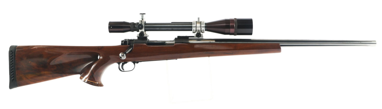 WINCHESTER MODEL 70 .30-06 CALIBER RIFLE: WINCHESTER MODEL 70 .30-06 CALIBER RIFLE Winchester Model 70 Custom .30-06 caliber bolt action rifle. 22 inch stainless steel fluted barrel marked R. Gould. Walnut thumbhole stock. Mounted Unertl 2" U