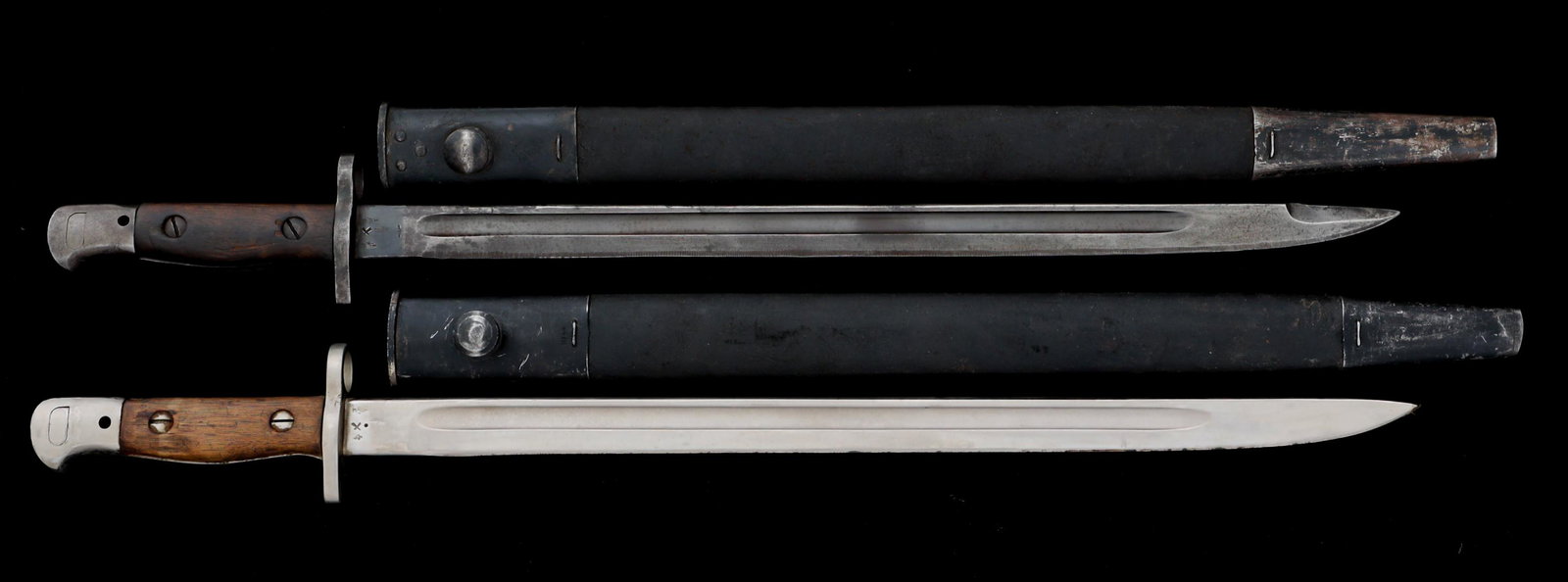 WWI - WWII BRITISH P1907 REARSENALED BAYONETS LOT: WWI - WWII BRITISH P1907 REARSENALED BAYONETS LOT Lot of 2 WWI - WWII British P1907 Rearsenaled Enfield Rifle Bayonets. (1) P1907 Bayonet. Slight drop point, straight blade with fuller. Maker mark / l