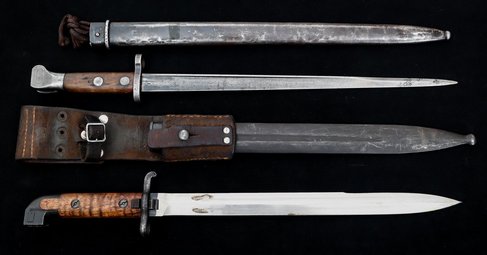WWI DUTCH M1895 & SWEDISH M1914 BAYONETS: WWI DUTCH M1895 & SWEDISH M1914 BAYONETS Lot of 2 WWI Dutch M1895 and Swedish M1914 Bayonets. (1) Dutch M1895 Bayonet. Spear point, straight, T-back spine blade. Maker marked "CE" over "WG" on the ric