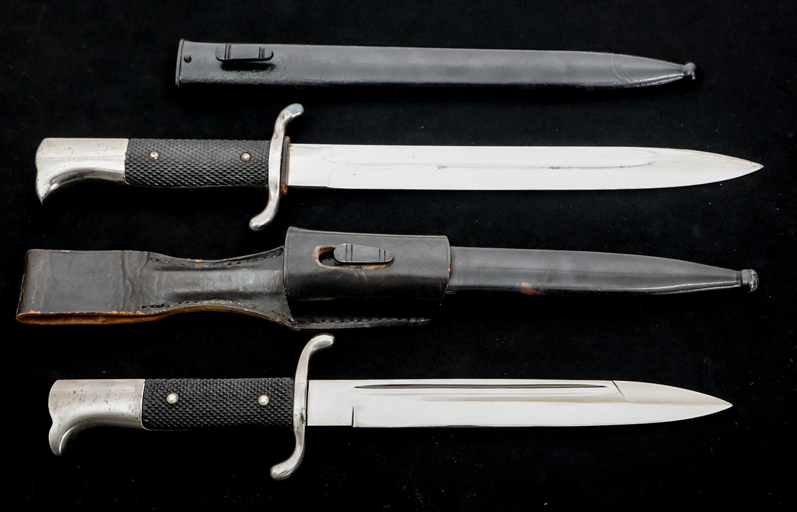 WWII GERMAN K98 FIREMAN DRESS BAYONET LOT OF 2: WWII GERMAN K98 FIREMAN DRESS BAYONET LOT OF 2 Lot of 2 WWII German K98 Fireman's Dress Bayonets with Black Painted Steel Scabbards. (1) K98 dress bayonet. Spear point, bright, straight blade with ful