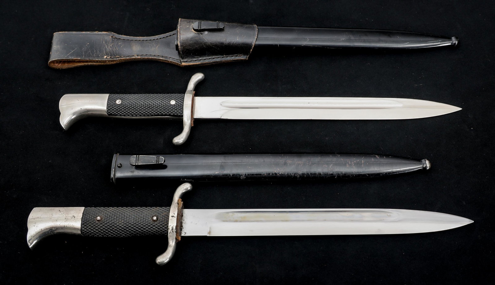 WWII GERMAN K98 FIREMAN DRESS BAYONET LOT OF 2: WWII GERMAN K98 FIREMAN DRESS BAYONET LOT OF 2 Lot of 2 WWII German K98 Fireman's Dress Bayonets with Black Painted Steel Scabbards. (1) K98 dress bayonet. Spear point, bright, straight blade with ful