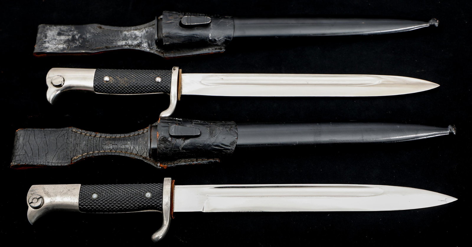 WWII GERMAN K98 DRESS BAYONET LOT OF 2: WWII GERMAN K98 DRESS BAYONET LOT OF 2 Lot of 2 WWII German K98 Dress Bayonets with Black Painted Steel Scabbards. (1) K98 dress bayonet. Spear point, bright, straight blade with fuller. No visible ma