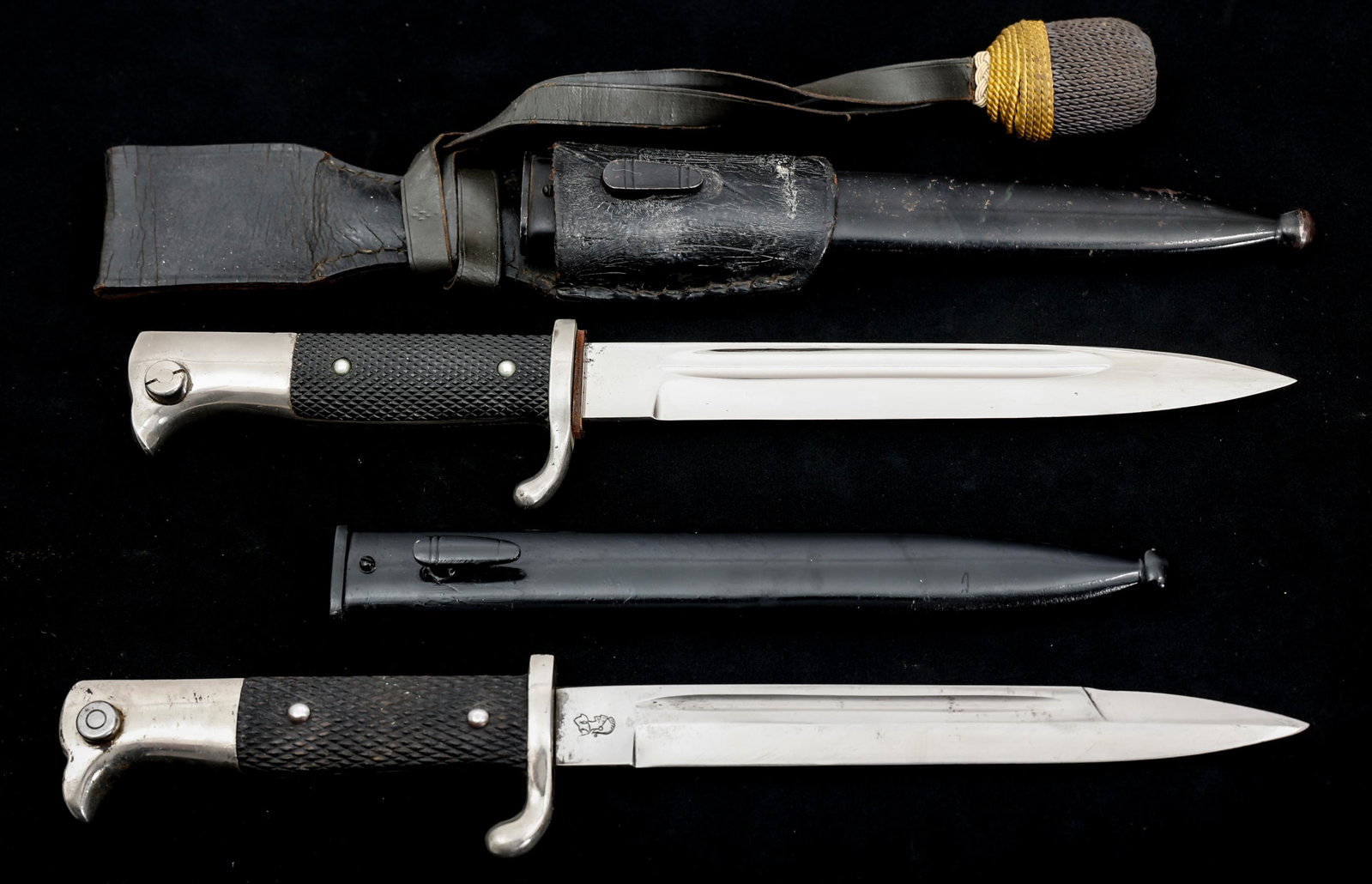 WWII GERMAN K98 DRESS BAYONET LOT OF 2: WWII GERMAN K98 DRESS BAYONET LOT OF 2 Lot of 2 WWII German K98 Dress Bayonets with Black Painted Steel Scabbards. (1) K98 dress bayonet. Spear point, bright, straight blade with fuller. Maker marked/