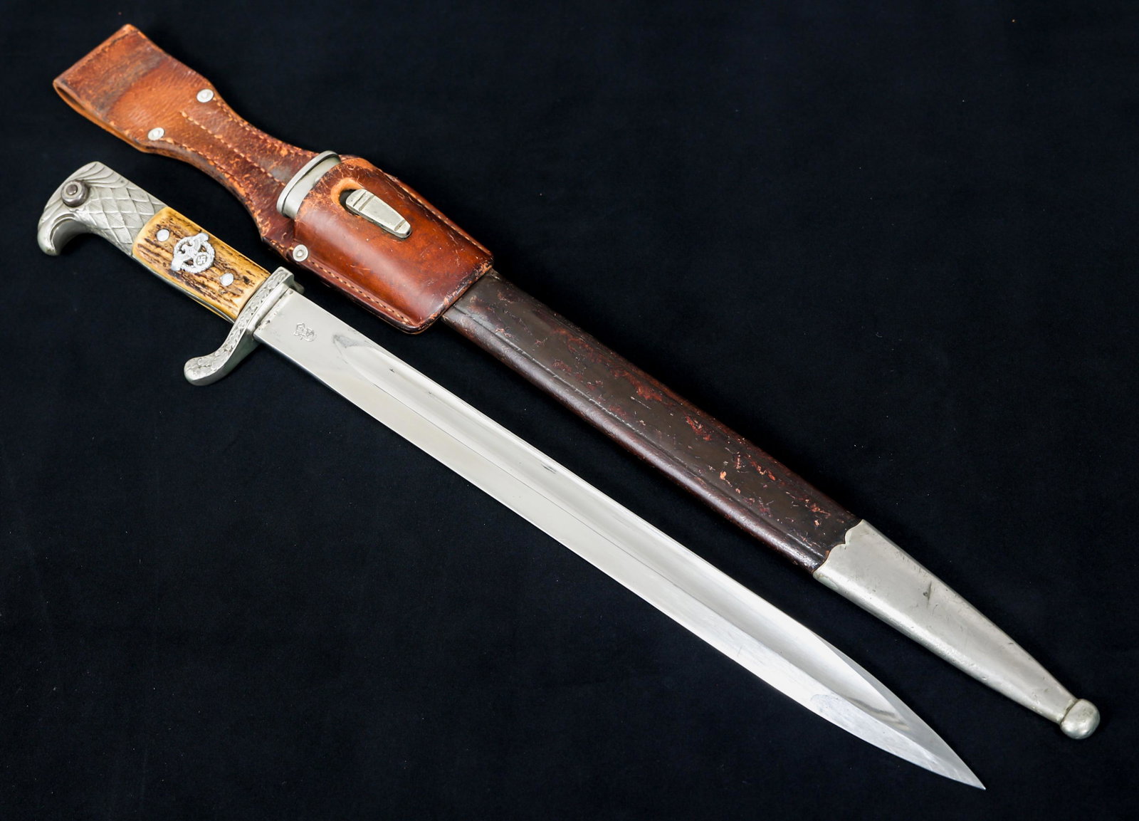WWII GERMAN POLICE DRESS BAYONET BY WKC: WWII GERMAN POLICE DRESS BAYONET BY WKC German Police "Cut Down" Dress Bayonet. Bright blade with fuller. Maker mark / logo "WKC" stamped on one side of the ricasso and "Weyersberg Kirschbaum & Cie, S