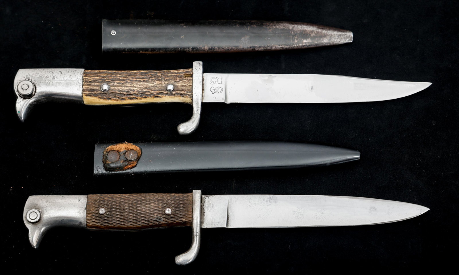 WWII GERMAN KS98 TRENCH KNIFE LOT OF 2: WWII GERMAN KS98 TRENCH KNIFE LOT OF 2 Lot of 2 WWII German KS98 Trench Knife Bayonets with Black Painted Steel Scabbard. (1) KS98 Fixable knife bayonet. Clip point, bright blade. Maker mark/logo of "
