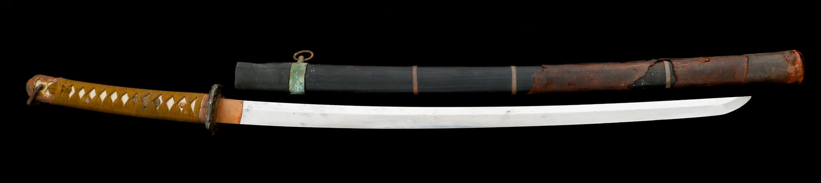 WWII JAPANESE ARMY OFFICER LATE WAR SHIN GUNTO: WWII JAPANESE ARMY OFFICER LATE WAR SHIN GUNTO WWII Imperial Japanese Army Officer Type 98 Shin Gunto Sword. Single edged, bright, slightly curved blade. Midare style Hamon. Copper Habaki. Decorated,