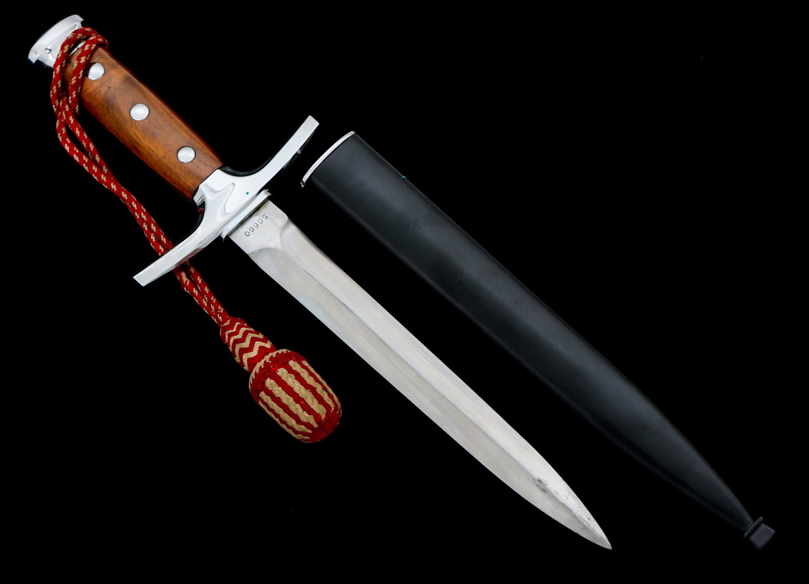 WWII SWISS ARMY M43 OFFICER DRESS DAGGER: WWII SWISS ARMY M43 OFFICER DRESS DAGGER Swiss Army Model 1943 Officer Dress Dagger & Portepee. Spear point, double edged, bright blade. Maker marked on the ricasso "Elsener Schwyz Victoria" and seria