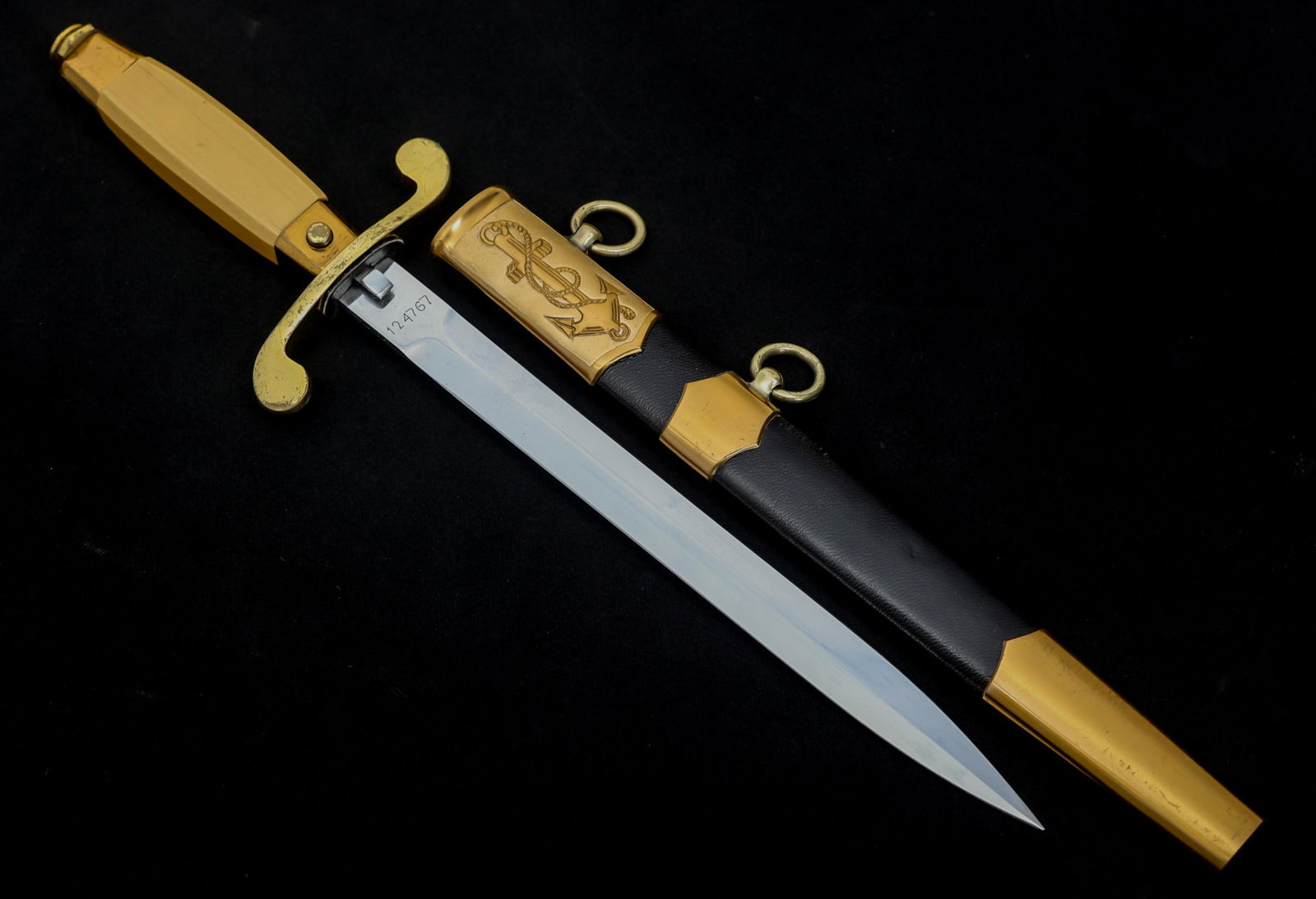 COLD WAR SOVIET UNION NAVAL OFFICER DAGGER: COLD WAR SOVIET UNION NAVAL OFFICER DAGGER USSR Soviet Union Naval Officer's Dagger. Bright chrome plated blade, electro-pen marked ricasso "124767" and "1982" with Cyrillic markings. Leather buffer p