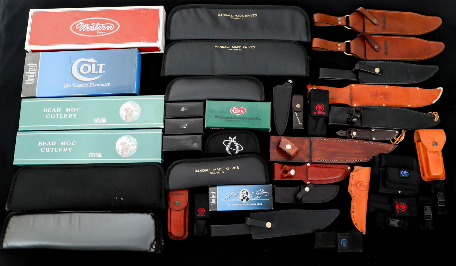 LEATHER SHEATHS AND KNIFE BOX LOT: LEATHER SHEATHS AND KNIFE BOX LOT Lot of Assorted Leather Sheaths and Knife boxes. Makers include Randall Made Knives, Boker, Colt, Bear MGC, Western, Case XX, And more.