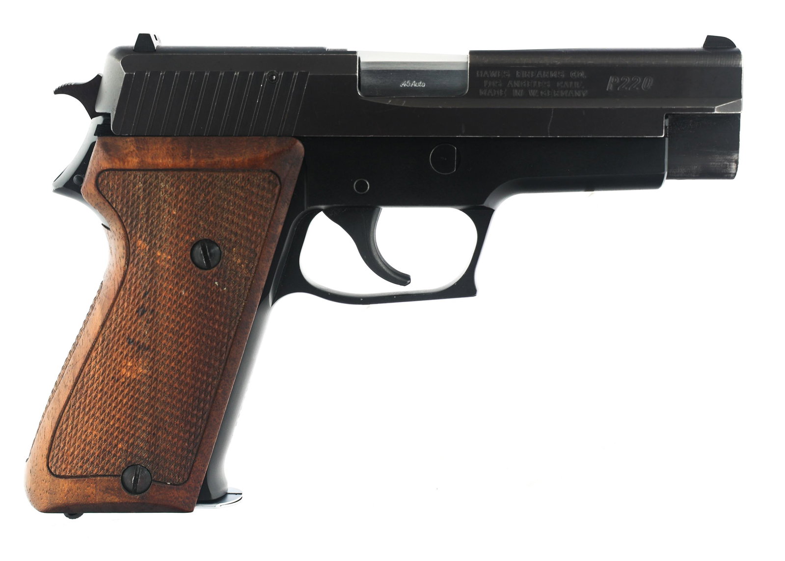 1977 SIG SAUER MODEL P220 .45 ACP CALIBER PISTOL: 1977 SIG SAUER MODEL P220 .45 ACP CALIBER PISTOL 1977 Sig Sauer model P220 SA / DA .45 ACP caliber pistol. Black finish. Fixed sights. Hawes Firearms Co. Los Angles Calif. import mark. Made in Germany