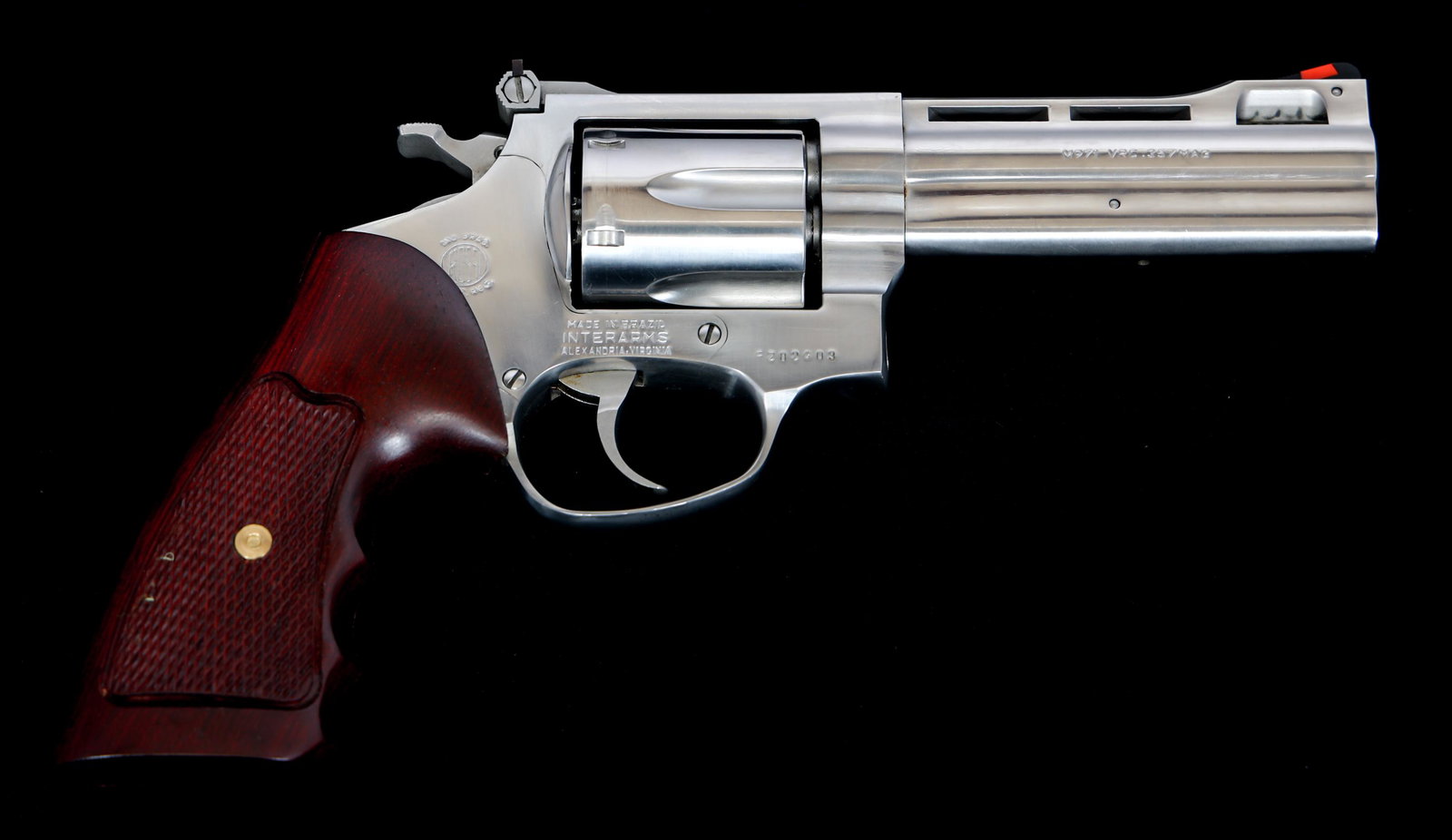 ROSSI MODEL 971 .357 MAGNUM CALIBER DA REVOLVER: ROSSI MODEL 971 .357 MAGNUM CALIBER DA REVOLVER Rossi Model 917 VRC .357 Magnum caliber double action revolver. Import marked "Interarms Alexandria Virginia". Stainless steel finish. Checkered wood gr