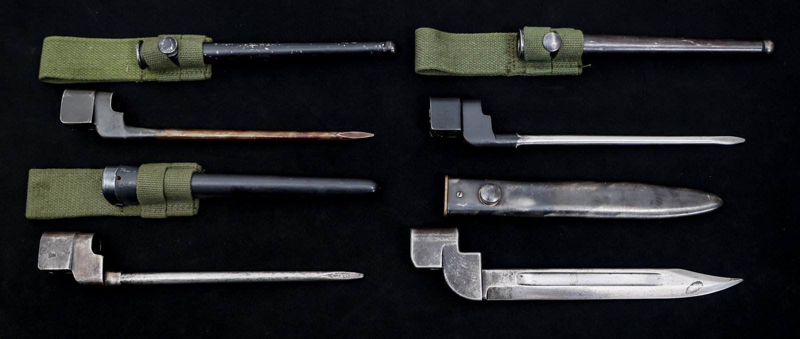 WWII - COLD WAR ERA MKII BAYONETS LOT OF 4: WWII - COLD WAR ERA MKII BAYONETS LOT OF 4 Lot of 4 WWII - Cold War Era British and Canadian Bayonets. (1) British No.9 Mk. I Bayonet. Clip point, bright, straight blade with fuller. Maker mark / logo