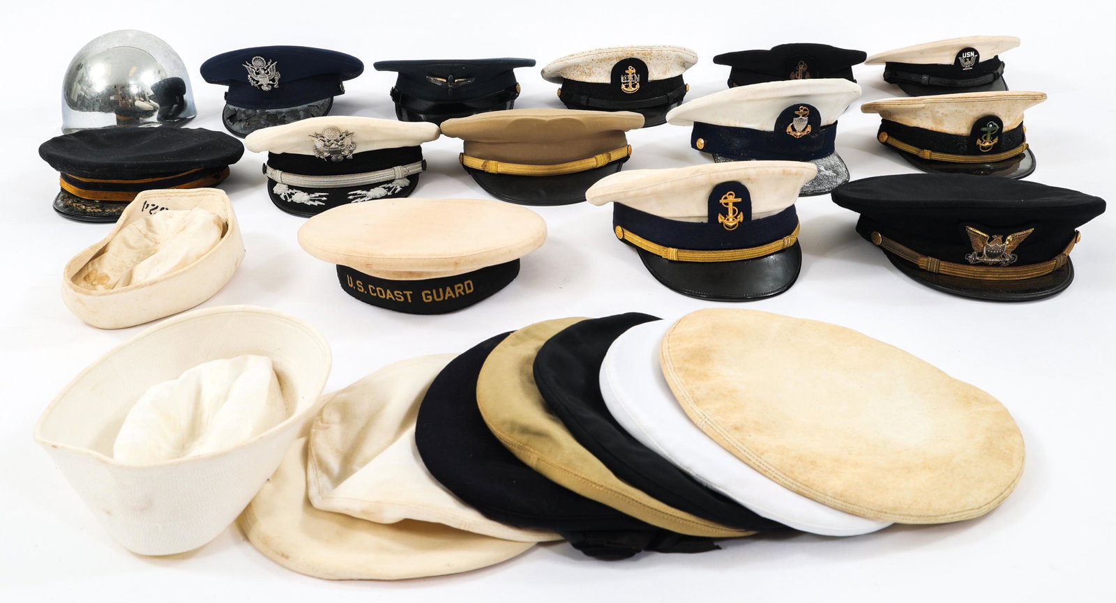 WWII - COLD WAR US ARMED FORCES CAPS & LINER: WWII - COLD WAR US ARMED FORCES CAPS & LINER Mixed Lot of WWII - Cold War US Armed Forces Enlisted and Officer Service Caps, Covers and M1 Liner. USAAF, Army, Navy, Coast Guard, USAF service caps and
