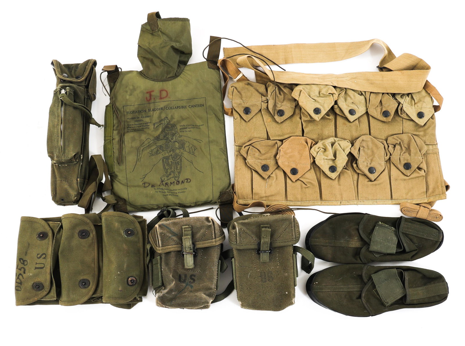 VIETNAM WAR US ARMY FIELD GEAR LOT: VIETNAM WAR US ARMY FIELD GEAR LOT Vietnam War Era US Army Field Gear Lot. Including: (1) M-16 bipod & cleaning kit pouch. (1) Collapsible canteen. (1) WWI Chest pouch (still used in Nam). (1) 3 pocke