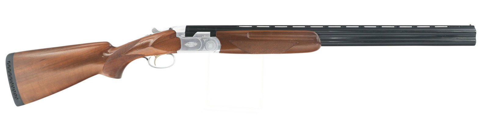 TRISTAR MODEL 330 O/U 20 GAUGE SHOTGUN: TRISTAR MODEL 330 O/U 20 GAUGE SHOTGUN Tristar Model 330 20 gauge Over/Under shotgun. 28" vent rib barrels with removable chokes, cylinder and improved cylinder. Chambered for 3" shells. Checkered woo