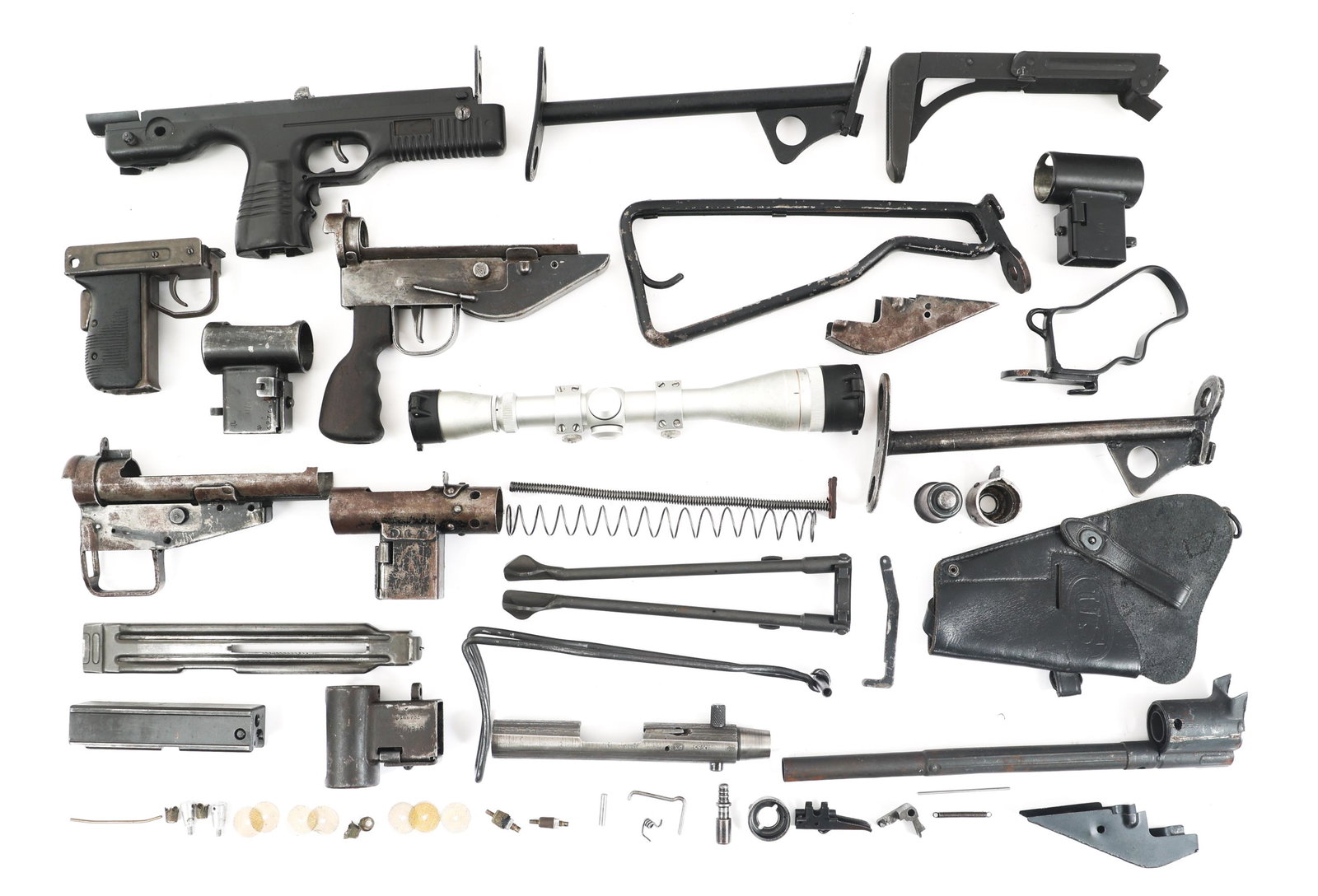 UZI AND STEN STOCK AND RECEIVER PARTS LOT: UZI AND STEN STOCK AND RECEIVER PARTS LOT UZI and Sten parts lot. Stock parts. Receiver parts. Leupold Vari X IIc 6-18x40 scope.