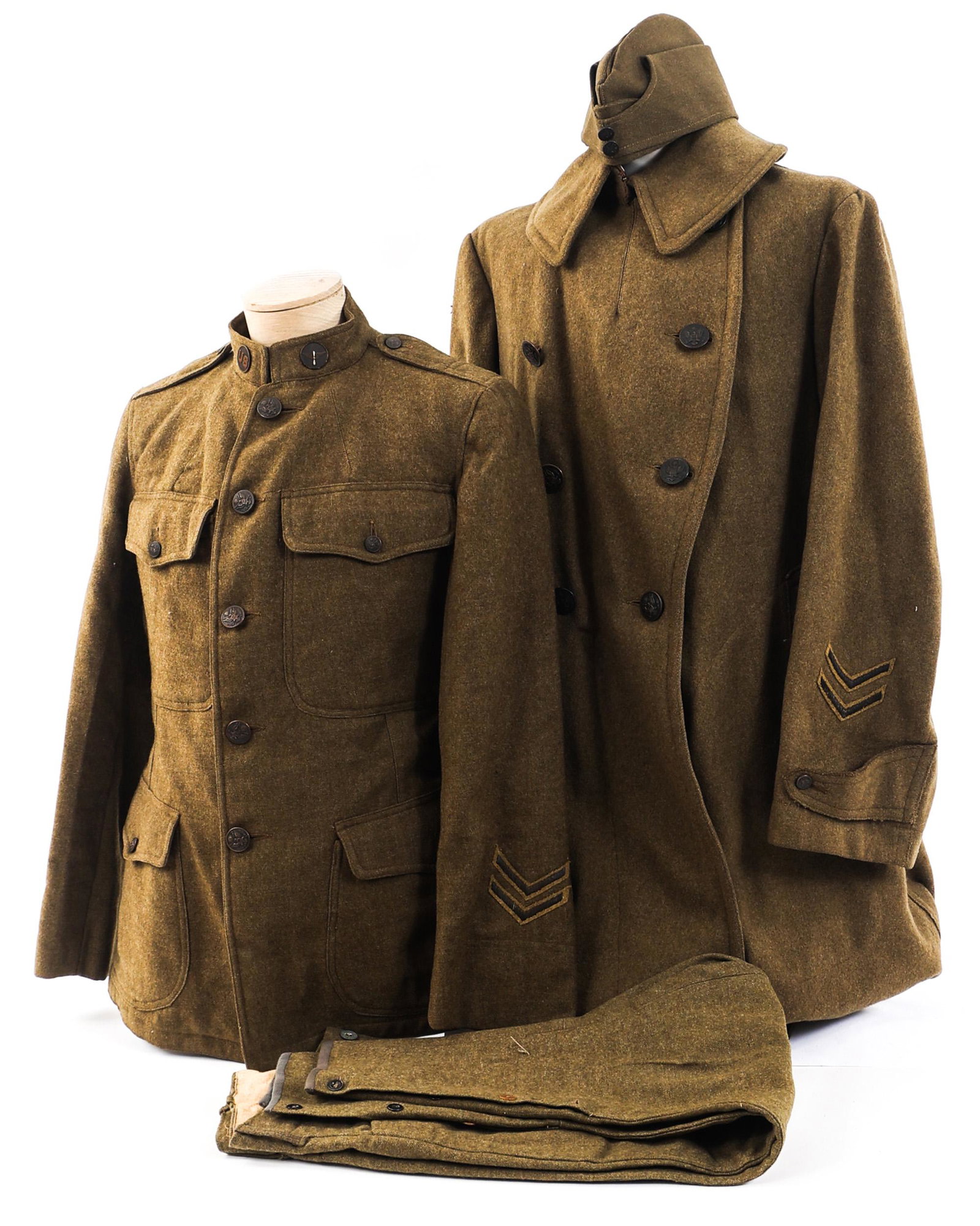 WWI US ARMY AEF AIR SERVICE MECHANIC UNIFORM GROUP: WWI US ARMY AEF AIR SERVICE MECHANIC UNIFORM GROUP WWI US Army Air Corps, Air Service Mechanic NCO's Uniform Grouping. (1) M1917 wool tunic with "US" and propeller collar insignia, A.S mechanic propel