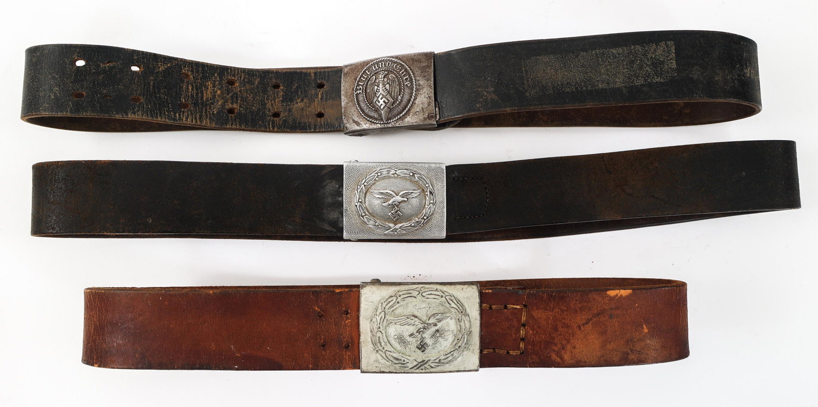 WWII GERMAN LUFTWAFFE & HITLER YOUTH LEATHER BELTS: WWII GERMAN LUFTWAFFE & HITLER YOUTH LEATHER BELTS Lot of 3 WWII German Luftwaffe and Hitler Youth Leather belts and Buckles. (1) Aluminum Luftwaffe Buckle and Belt. Brown leather, maker marked by "Ho