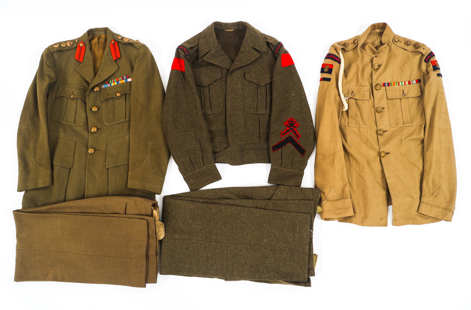 WWI - COLD WAR BRITISH & CANADIAN DRESS UNIFORMS: WWI - COLD WAR BRITISH & CANADIAN DRESS UNIFORMS WWI - Cold War British and Canadian Dress Uniforms. (1) WWI British Artillery Officer Khaki Tunic. Cotton construction. Royal Artillery tab, patches an