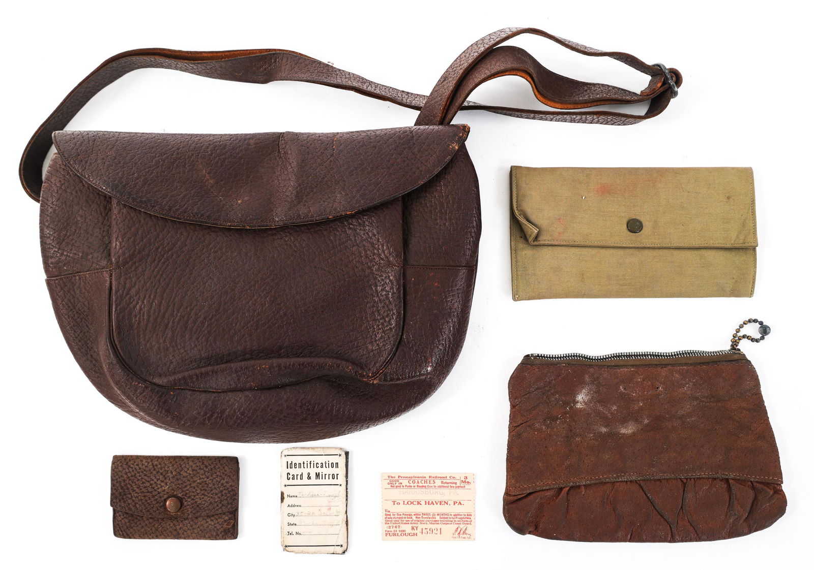 WWII US ARMY NURSE CORPS LEATHER PURSE: WWII US ARMY NURSE CORPS LEATHER PURSE WWII US Army Nurse Corps Leather Purse. Purse has label inside that reads "Virginia L. Emrich A-301204". Three smaller bags inside with an identification card &