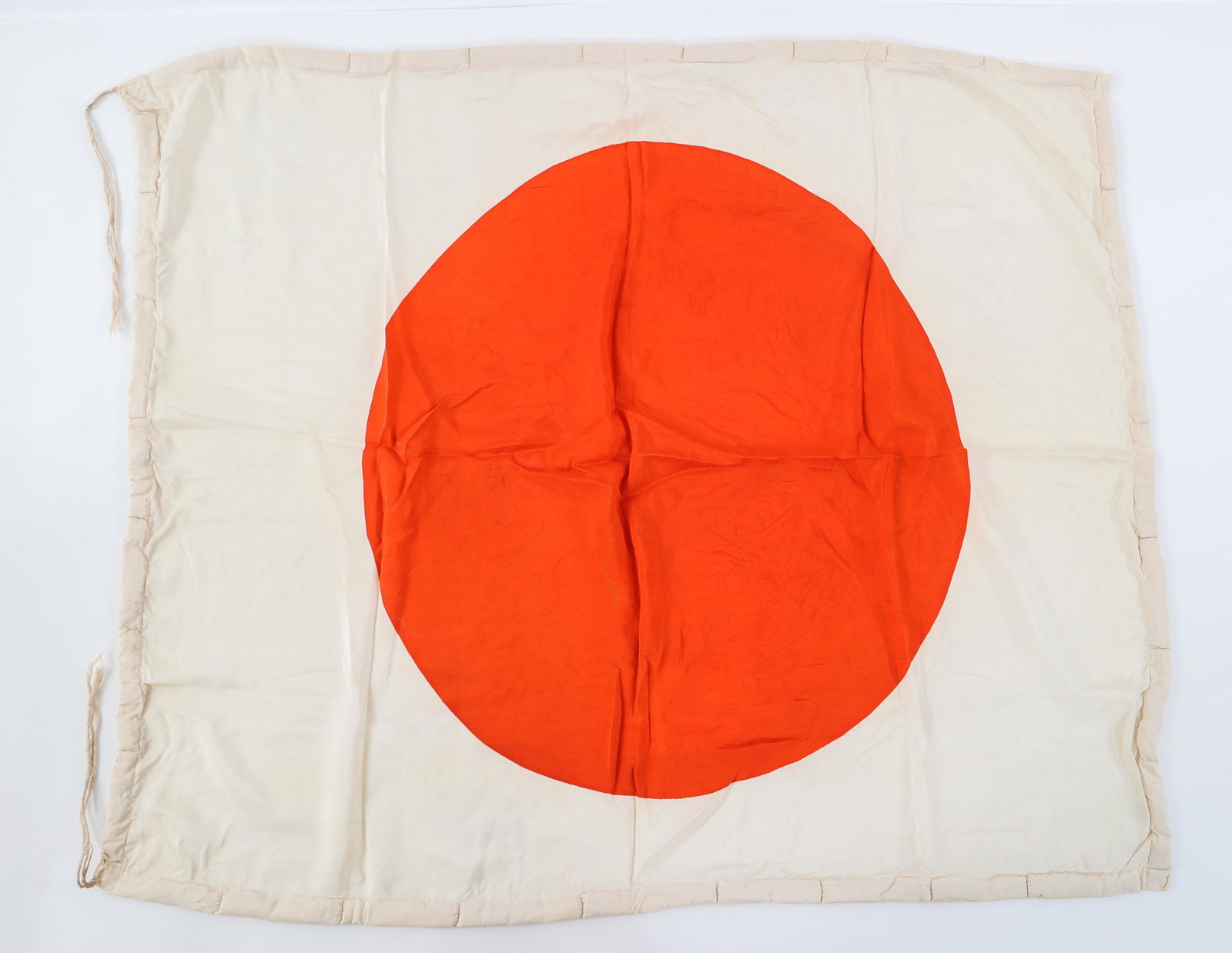 WWII JAPANESE AIRCREW & PILOT'S SURVIVAL FLAG: WWII JAPANESE AIRCREW & PILOT'S SURVIVAL FLAG WWII Imperial Japanese Aircrew / Pilot's Survival Flag. Silk "Meatball" National flag with Kapok border. Size: 36" x 29"