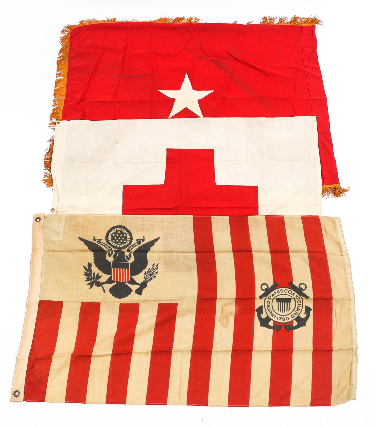 WWII COAST GUARD - GENERAL & RED CROSS FLAG LOT: WWII COAST GUARD - GENERAL & RED CROSS FLAG LOT WWII - Cold War US Armed Forces & Red Cross Flags. (1) WWII US Coast Guard flag. Double sided printed on linen. Size: 51" x 30". (1) WWII - Cold War Bri