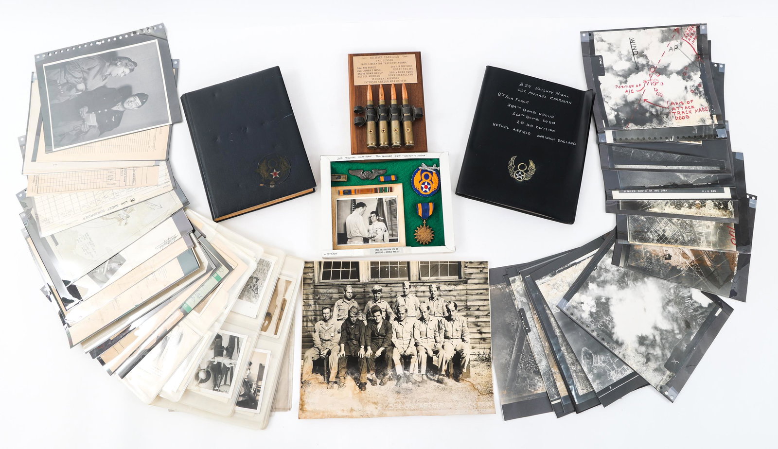 WWII 2 USAAF NAMED BOMBER NCO & OFFICER GROUPINGS: WWII 2 USAAF NAMED BOMBER NCO & OFFICER GROUPINGS Lot of 2 WWII USAAF Bomber Crew NCO and Officer Groupings. Named to Staff Sergeant Michael Carrigan, 33094606 assigned to the 8th Air Force, 389th Bom