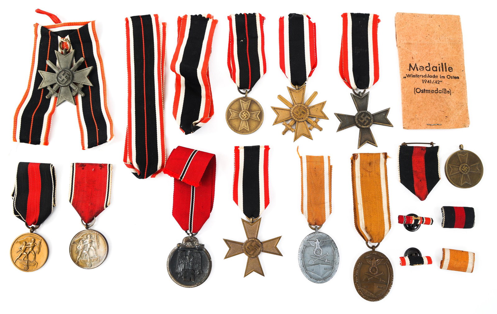 WWII GERMAN WAR MERIT CROSS & MEDALS LOT: WWII GERMAN WAR MERIT CROSS & MEDALS LOT Lot of WWII German Medals and Ribbons. Includes War Merit Cross 2nd Class and 3rd Class; East Medal; Commemorative Medal for 1 October 1938; West Wall campaign