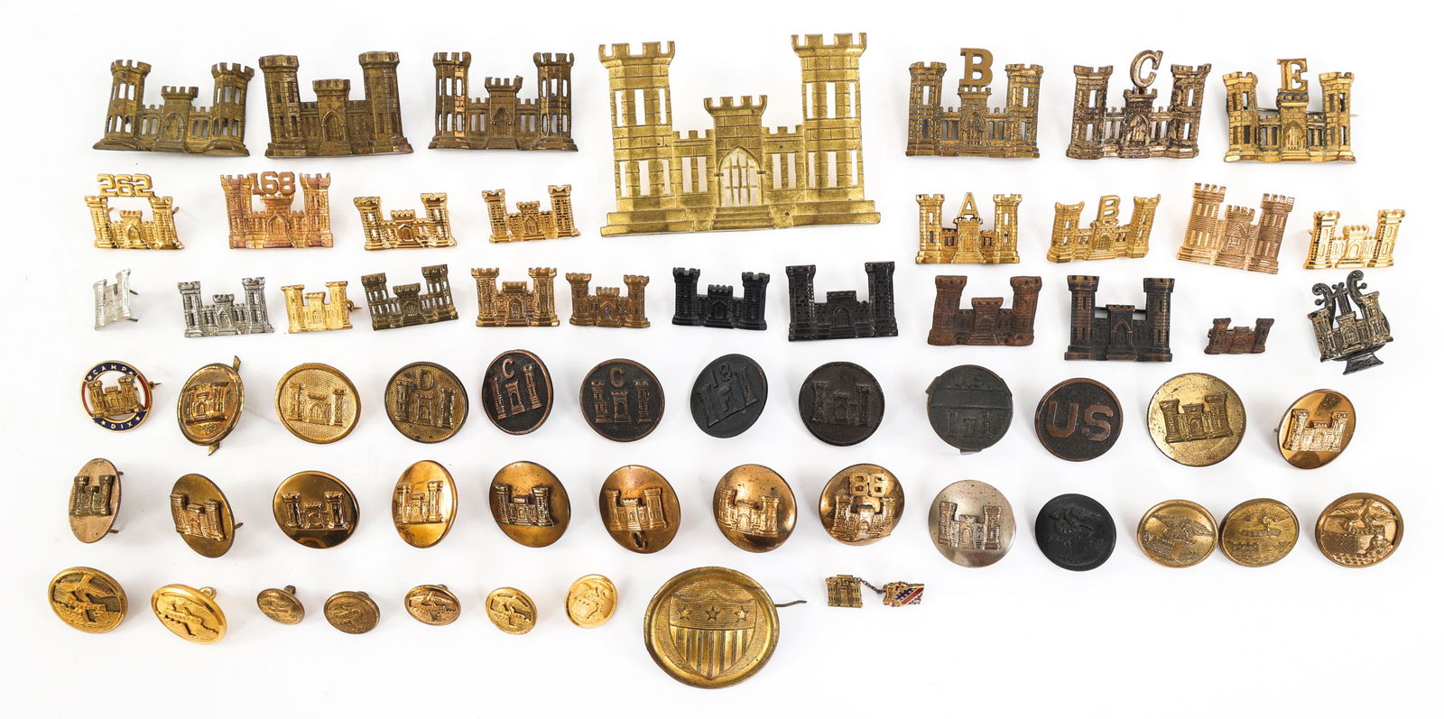 19th C. - COLD WAR US ARMY COE INSIGNIA PINS: 19th C. - COLD WAR US ARMY COE INSIGNIA PINS WWI - Cold War US Army Corps of Engineer Insignia pins. Display case of assorted sizes of shako, cap, and collar insignia. Display case included. Size: 11"