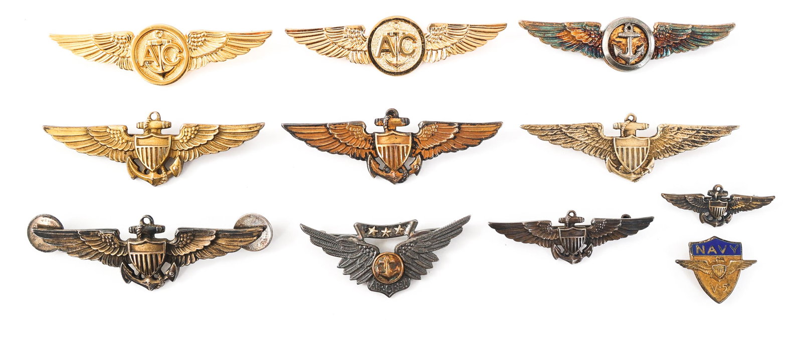 WWII - COLD WAR US NAVY QUALIFICATION WINGS: WWII - COLD WAR US NAVY QUALIFICATION WINGS Lot of 11 WWII - Cold War US Navy Qualification Wings. (2) USN / USMC Air Crew wings, 2 13/16", one NS Meyer pin-back, one V-21-N, 10K GF, clutch-back. (1) 