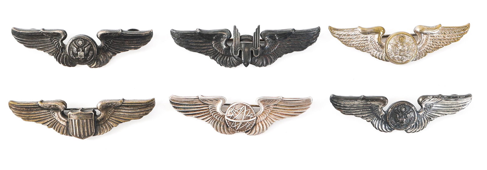 WWII AAF PILOT - AIRCREW - NAVIGATOR & GUNNER WING: WWII AAF PILOT - AIRCREW - NAVIGATOR & GUNNER WING Lot of 6 WWII US Army Air Force Qualification Wings. (1) WWII AAF Aircrew wings, British made, pin-back, unmarked. Size: 3". (2) WWII AAF Aircrew qua