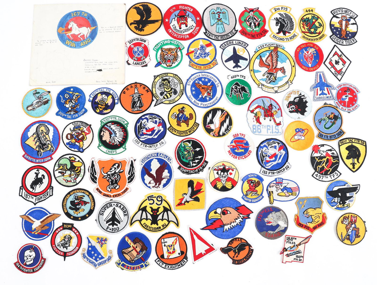 COLD WAR US AIR FORCE FIGHTER SQUADRON PATCH LOT: COLD WAR US AIR FORCE FIGHTER SQUADRON PATCH LOT Lot of Approximately 66 Cold War US Air Force Fighter Squadron Patches. Provenance: New old stock acquired by the consignor from the N.S. Meyer New Yor