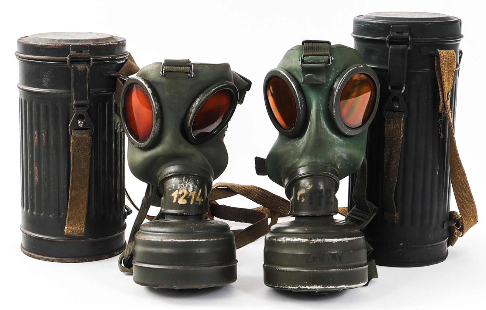 WWII GERMAN ARMY M38 GAS MASK LOT OF 2: WWII GERMAN ARMY M38 GAS MASK LOT OF 2 Lot of 2 WWII German Army M38 Gas mask. (1) WWII German M38 gas mask with smoked lenses. Size 3. Filter dated 43. Short canister bears a hand written named on th