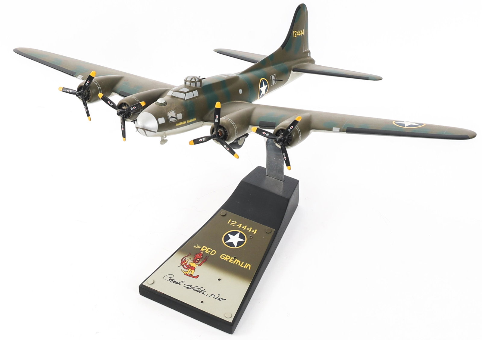 WWII PAUL TIBBETS SIGNED RED GREMLIN MODEL B-17: WWII PAUL TIBBETS SIGNED RED GREMLIN MODEL B-17 WWII Paul Tibbets Signed "Red Gremlin" B-17E/F Model Plane. Made of plastic, signature located on stand. Size: 15.5" x 21"