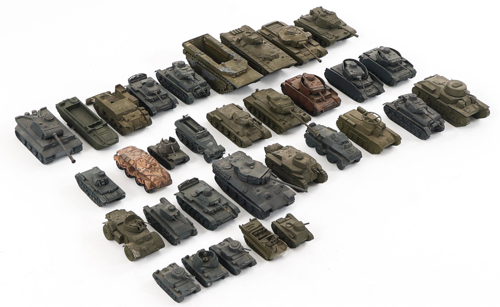 WWII - COLD WAR WORLD MILITARY CAST MODEL TANK TOY: WWII - COLD WAR WORLD MILITARY CAST MODEL TANK TOY Lot of WWII - Cold War World Military Cast Model Tank Toys. Assorted tanks, armored troop carriers, Half tracks and more. Approximate weight: 9 lbs.