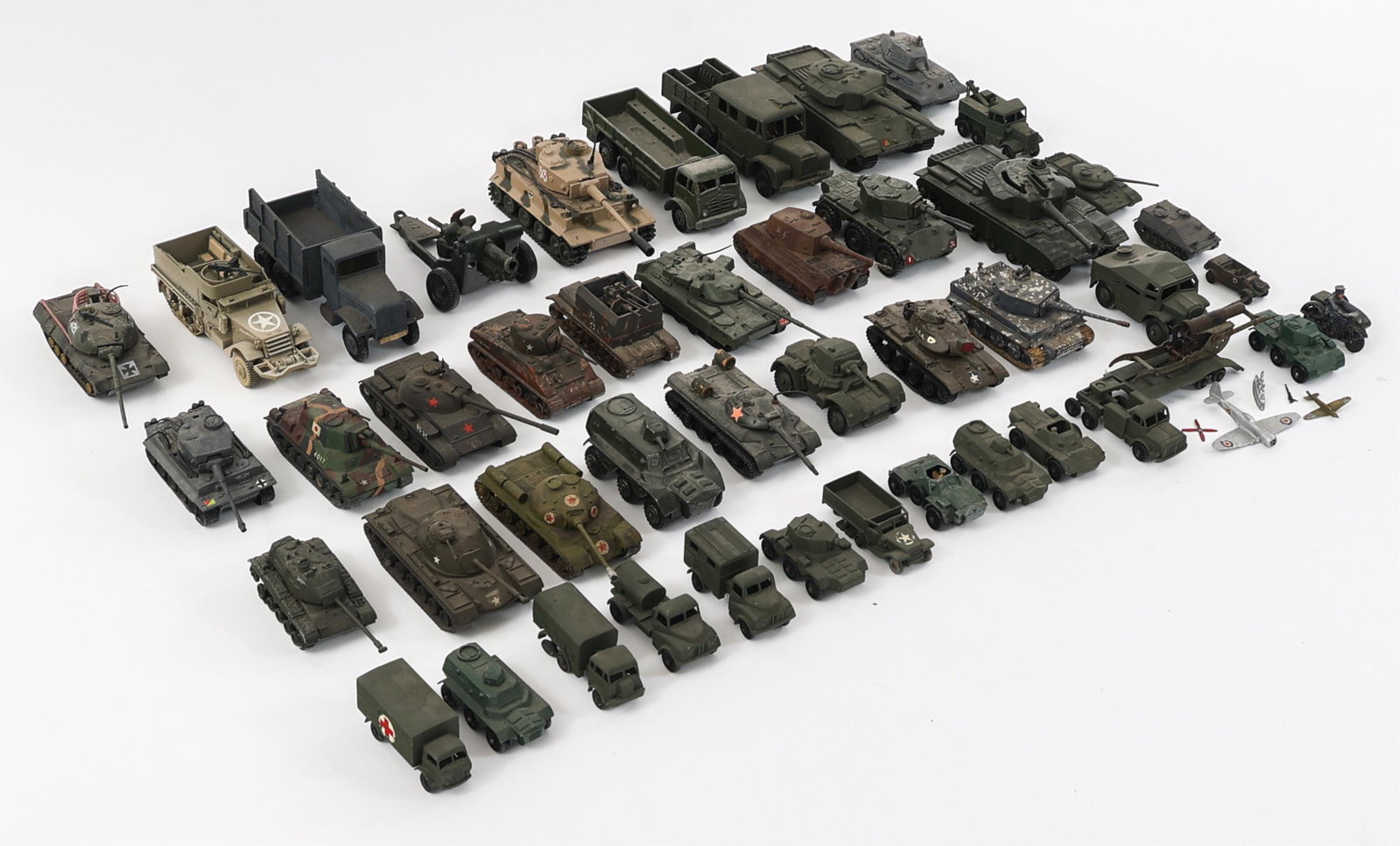 WWII - COLD WAR WORLD MILITARY VEHICLE TOYS: WWII - COLD WAR WORLD MILITARY VEHICLE TOYS Lot of WWII - Cold War World Military Vehicle Toys. Plastic and metal Tanks, Armored Cars, Transport Trucks, Artillery and more. Makers include Premier, Cor