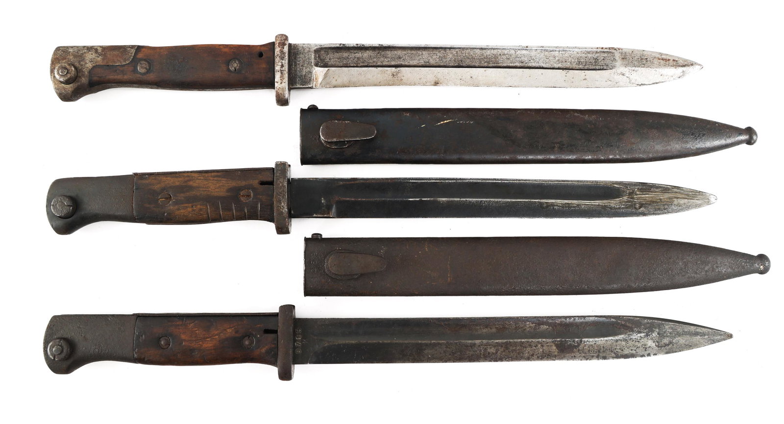 WWI - WWII GERMAN K98 COMBAT BAYONET LOT OF 3: WWI - WWII GERMAN K98 COMBAT BAYONET LOT OF 3 Lot of 3 WWI - WWII German Bayonets. (1) K98 Bayonet. Single edged, blued blade with fuller. Maker marked by Coppel G.m.b.H on one side of the ricasso and