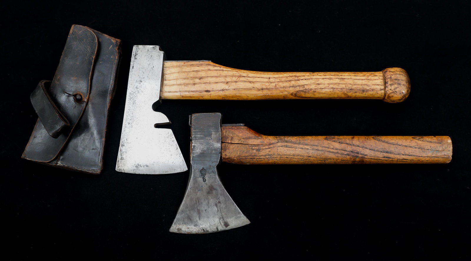WWI BRITISH MILITARY HATCHETS LOT OF 2: WWI BRITISH MILITARY HATCHETS LOT OF 2 Lot of 2 WWI Military Hatchets. (1) WWI British hatchet. Blued blade with extended butt. No maker mark visible. Inspection stamp "6" below a crown on the side ch
