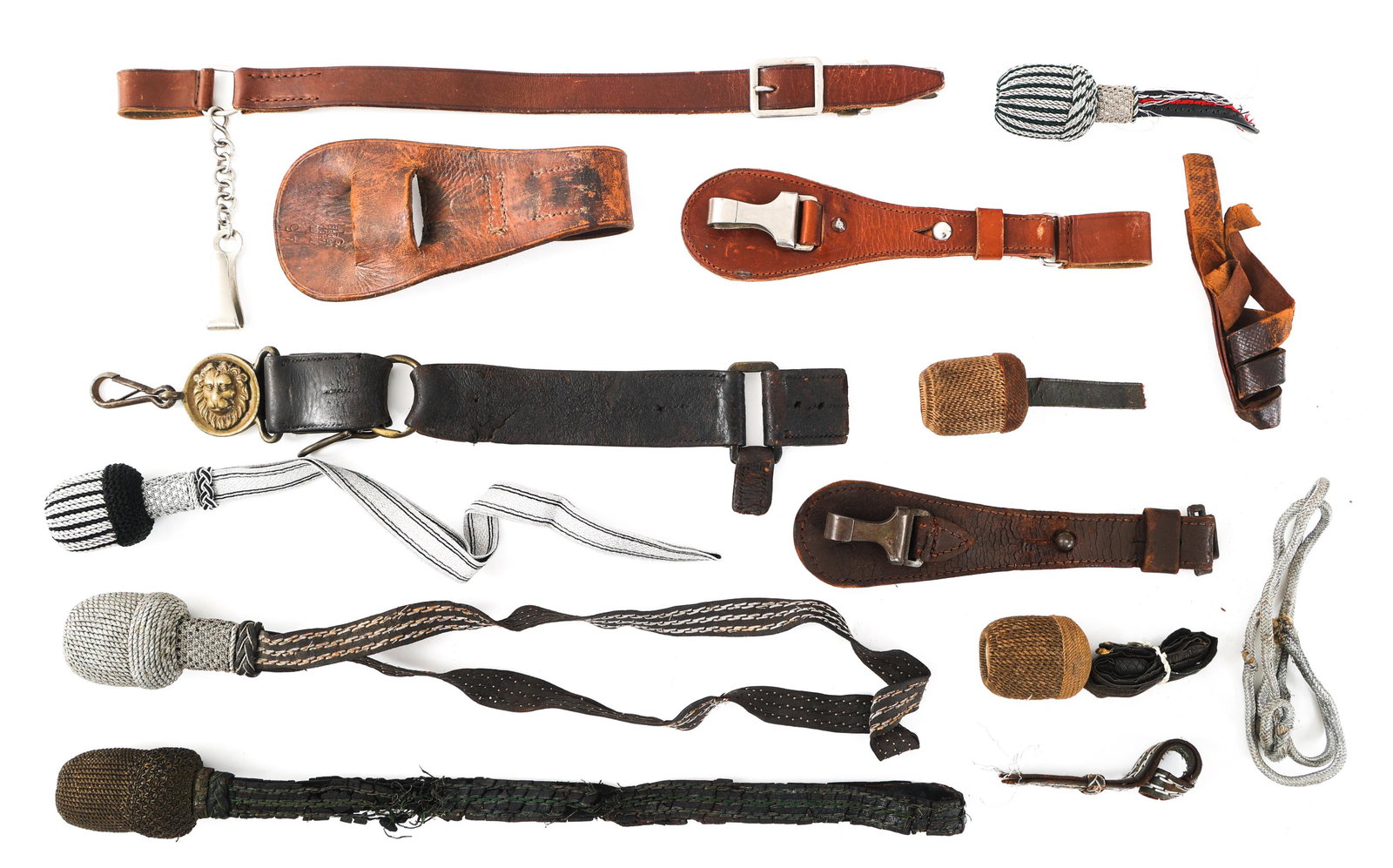 WWII GERMAN SWORD & DAGGER ACCOUTREMENTS: WWII GERMAN SWORD & DAGGER ACCOUTREMENTS WWII German Sword and Dagger Accoutrements. Including silver threaded portepee, early sword hangers, dagger belt attachments, portepees and more.