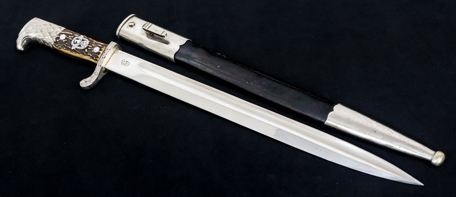 WWII GERMAN POLICE DRESS BAYONET BY WKC: WWII GERMAN POLICE DRESS BAYONET BY WKC German Police "Cut Down" Dress Bayonet. Bright blade with fuller. Maker mark / logo "WKC" stamped on one side of the ricasso and "Weyersberg Kirschbaum & Cie, S