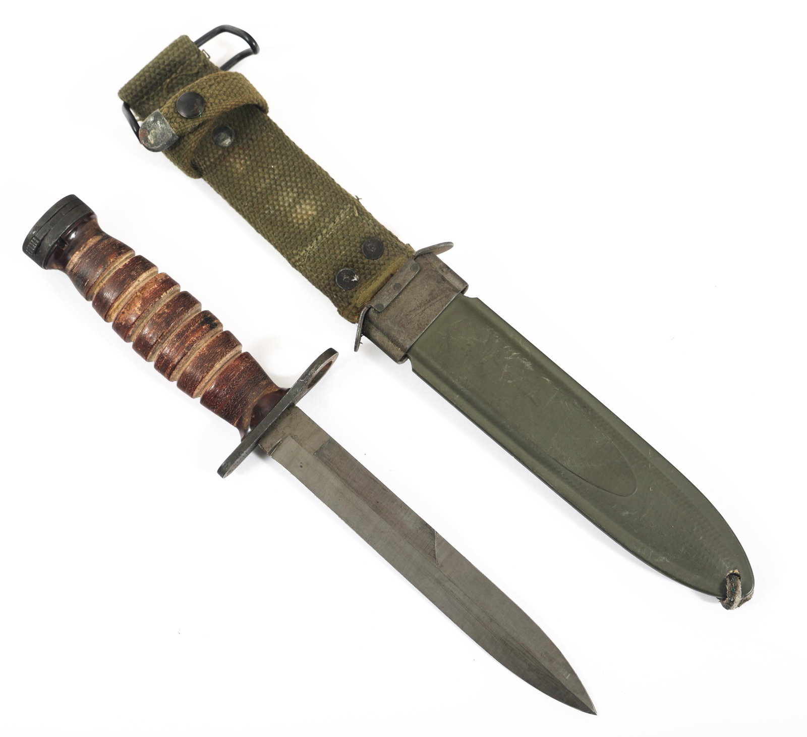 WWII US ARMY M4 BAYONET & SCABBARD BY IMPERIAL: WWII US ARMY M4 BAYONET & SCABBARD BY IMPERIAL WWII US Army M4 bayonet for M1 carbine. Parkerized blade, stacked leather handle. Stamped "U.S M4 Imperial" under the guard. USM8A1 scabbard. Blade Lengt