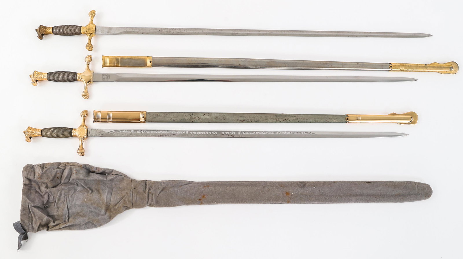 COLD WAR US MILITARY ACADEMY CADET SWORDS LOT OF 3: COLD WAR US MILITARY ACADEMY CADET SWORDS LOT OF 3 Lot of 3 Cold War US Cadet Swords. (1) US cadet sword with double edged bright blade. Maker marked by N.S. Meyer on the ricasso. Felt buffer pad pres