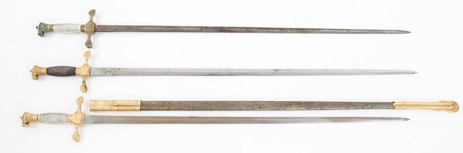 COLD WAR US MILITARY ACADEMY CADET SWORDS LOT OF 3: COLD WAR US MILITARY ACADEMY CADET SWORDS LOT OF 3 Lot of 3 Cold War US Cadet Swords. (1) US cadet sword with double edged bright blade. Double acid etched with light grey background. "Virginia Milita