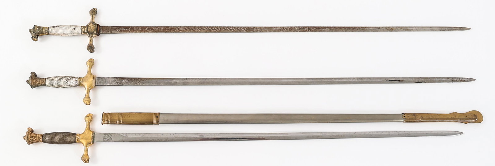 COLD WAR US MILITARY ACADEMY CADET SWORDS LOT OF 3: COLD WAR US MILITARY ACADEMY CADET SWORDS LOT OF 3 Lot of 3 Cold War US Military Academy Cadet Swords. (1) US cadet sword with double edged bright blade. Double acid etched. "Fork Union Military Acade