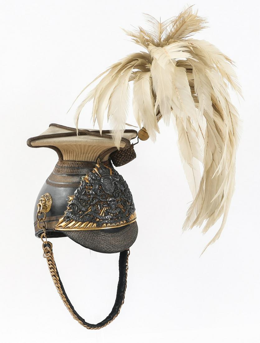 BRITISH M1857 17th LANCERS DRESS CHAPKA HELMET: BRITISH M1857 17th LANCERS DRESS CHAPKA HELMET Post 1902 British M1857 17th Lancers Officer's Dress Chapka Helmet. The skull and peak are composed of patent leather with gold bullion lace around the e