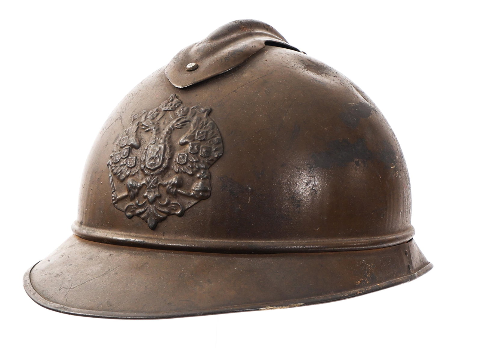 WWI IMPERIAL RUSSIAN M15 ADRIAN HELMET WITH LINER: WWI IMPERIAL RUSSIAN M15 ADRIAN HELMET WITH LINER WWI Imperial Russian M1915 - 16 Adrian Helmet. original khaki / brown paint, Imperial Russian Eagle front plate and leather liner. Leather chinstrap p
