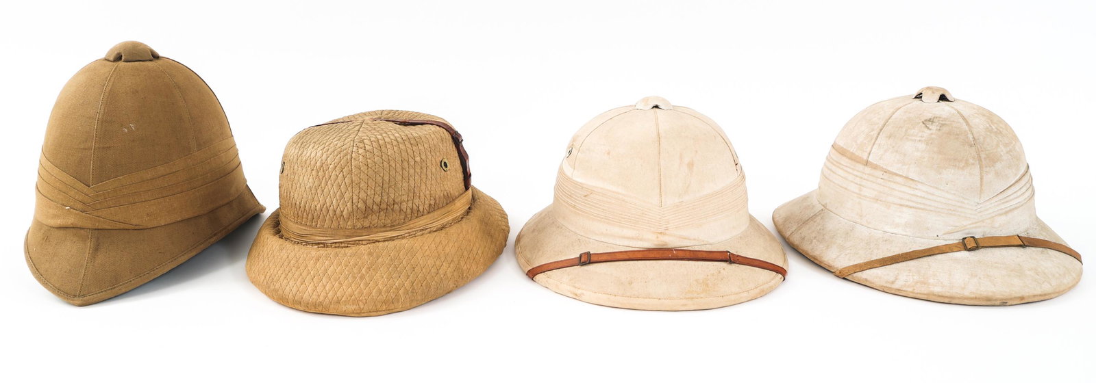 WWII - COLD WAR BRITISH COMMONWEALTH PITH HELMETS: WWII - COLD WAR BRITISH COMMONWEALTH PITH HELMETS Lot of 4 WWII - Cold War British Army Commonwealth summer pith helmet. Different patterns and maker marks. Size: Various