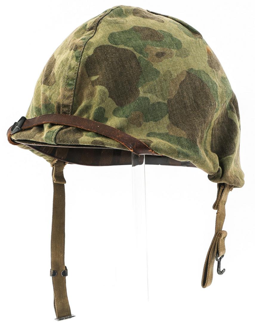 WWII US MARINE CORPS M1 COMBAT HELMET & CAMO COVER: WWII US MARINE CORPS M1 COMBAT HELMET & CAMO COVER WWII US Marine Corps M1 Combat Helmet With 1st Pattern Reversible Camo Cover. Late 42 production, swivel bales, front seam McCord shell serial number