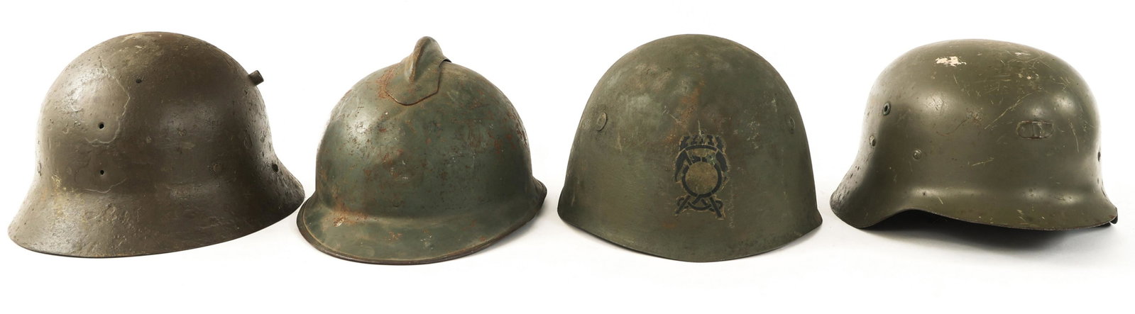 WWII WORLD MILITARY COMBAT HELMET LOT OF 4: WWII WORLD MILITARY COMBAT HELMET LOT OF 4 Lot of 4 WWII World Military Combat Helmets. (1) Czechoslovakian VZ30. (1) Italian M33. (1) Spanish M42 with single, frontal decal. (1) French M15 Adrian.